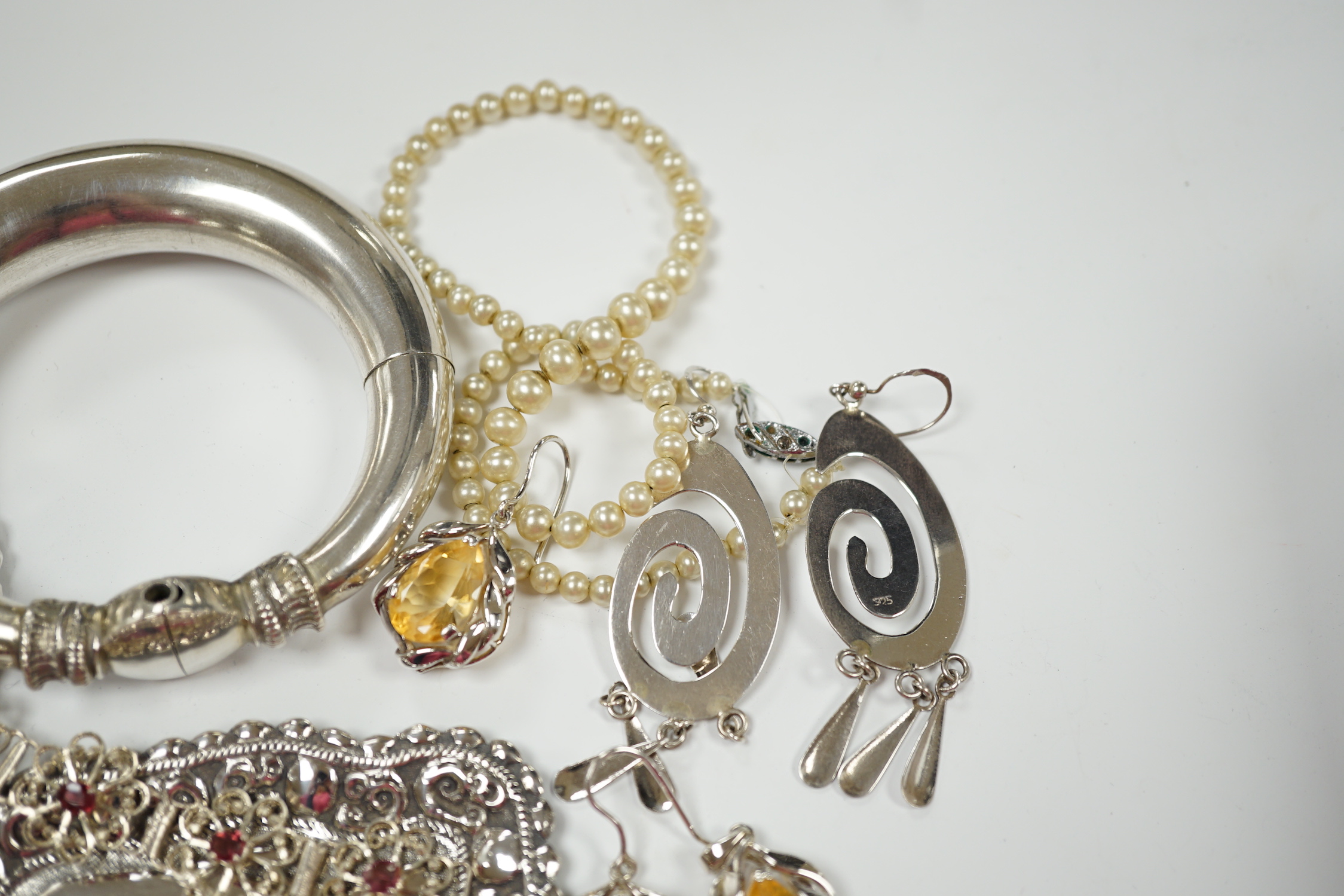 A quantity of assorted white metal jewellery, including bangle, necklace, earrings, etc.